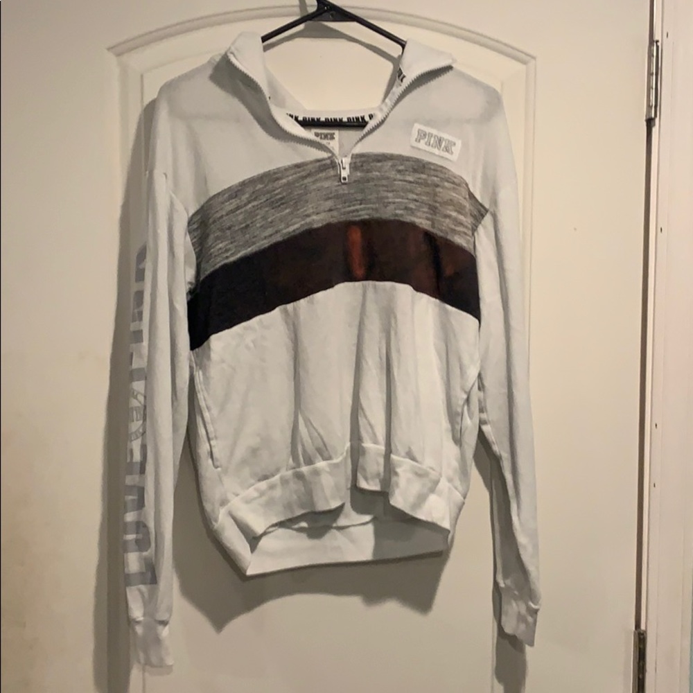 white zip up jacket